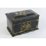 Victorian papier mache tea caddy, circa 1850, rectangular form with hinged cover decorated with a