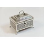 Indian military presentation white metal tea caddy, rectangular form with a domed hinged cover