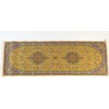Iranian Resvan style runner, deep yellow field with two medallions within blue and black borders,