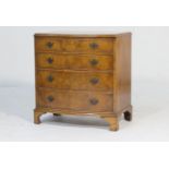 Burr walnut bow front chest of drawers, mid 20th Century, fitted with four long drawers with brass