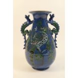 Brannam Barum vase, attributed to James Dewdney, baluster form with dragon handles at the neck,