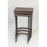 Nest of rosewood spider leg tables, 19th Century, rectangular form crossbanded and raised on slender