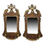 Pair of George II style walnut and parcel gilt wall mirrors, late 19th Century, each having a
