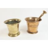 Traditional polished bronze pestle and mortar, small size decorated with a single horizontal band,