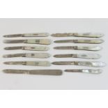 Twelve silver and mother of pearl folding fruit knives, all Sheffield hallmarks, 20th Century, circa