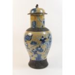 Chinese crackle ground lidded baluster vase, circa 1900, decorated in underglaze blue with