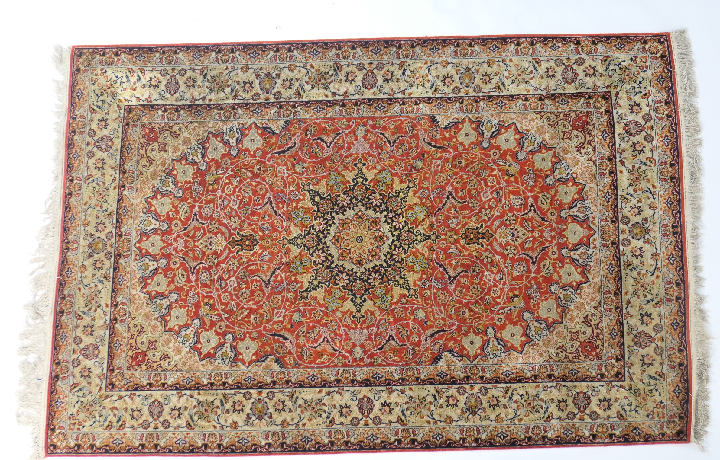 Iranian silk Khamarish rug, terracotta field with meandering tendrils within a fawn meandering