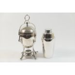Edwardian silver plated egg coddler, with scroll engraved decoration to the cover, raised on ball