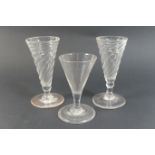 Pair of George III wrythen dwarf ale glasses, 12.5cm; also a further dwarf ale glass with folded