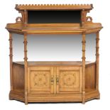 Victorian Gothic Revival satinwood chiffonier, circa 1875, having an upper shelf with mirrored