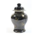 Chinese mirror black lidded jar, 19th Century, of inverted baluster form with a domed cover, with