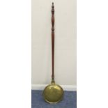 Good Georgian brass warming pan, circa 1800, finely turned walnut handle, the pan lid with traces of