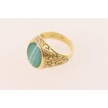 Gent's 18ct gold signet ring, inset with a green lace agate within foliate chased shoulders, size