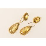 Pair of Victorian 18ct gold and citrine pendant earrings (with damages), having a tear shaped