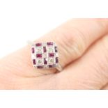 Attractive ruby and diamond cluster ring, Art Deco style, having small round brilliant diamonds