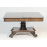 George IV mahogany pedestal dining table, the square top with rounded corners over a plain apron