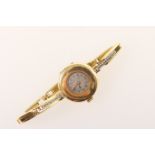 Lady's vintage 18ct gold bracelet wristwatch, circa 1925, the half hunter style case with 13mm