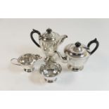 George V silver four piece tea service, London 1933, comprising teapot and hot water jug with