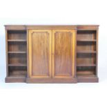 Victorian mahogany breakfront bookcase, late 19th Century, fitted with two central moulded panel