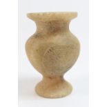 Egyptian alabaster footed jar, in the manner of those produced during the New Kingdom, circa 1550-