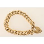 15ct gold hollow curb link bracelet, with engraved decoration and foliate engraved padlock clasp,