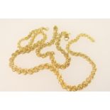 18ct gold fancy link necklace, and matching bracelet, having flattened multi-strand knot form links,