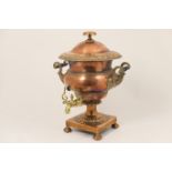 Early Victorian copper samovar, circa 1845, baluster form with domed cover, ebony and cast brass