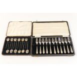 Eleven silver pastry forks, Birmingham 1936, cased, weight approx. 176g (5.65 troy ozs); also twelve