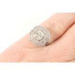 Attractive diamond cluster ring, circa 1920, central old step cut diamond of approx. 0.5ct estimated