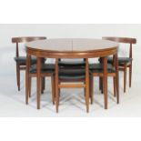 Frem Rojle (Danish) teak dining suite comprising extendable circular dining table, extending from