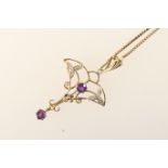 Amethyst and diamond pendant necklace, the openwork pendant worked with foliate fronds and centred