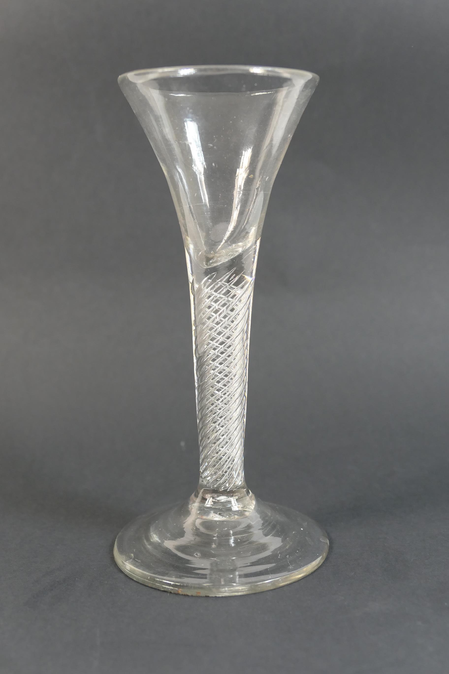 George II airtwist wine glass, circa 1750, having a trumpet bowl over a multi strand airtwist stem