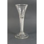 George II airtwist wine glass, circa 1750, having a trumpet bowl over a multi strand airtwist stem