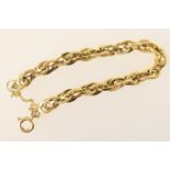 18ct gold cable link bracelet, having textured and smooth links, safety chain, marked '750',