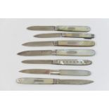 Seven Georgian silver and mother of pearl handled fruit knives including Sheffield hallmark for