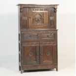 Carved oak court cupboard (made up), with elements of 17th Century and later carving, the top having