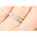 Diamond half eternity ring, having seven round brilliant cut diamonds totalling approx. 0.69ct,