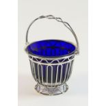 Edwardian silver sugar basket, London 1906, wirework form with swing handle, blue glass liner,
