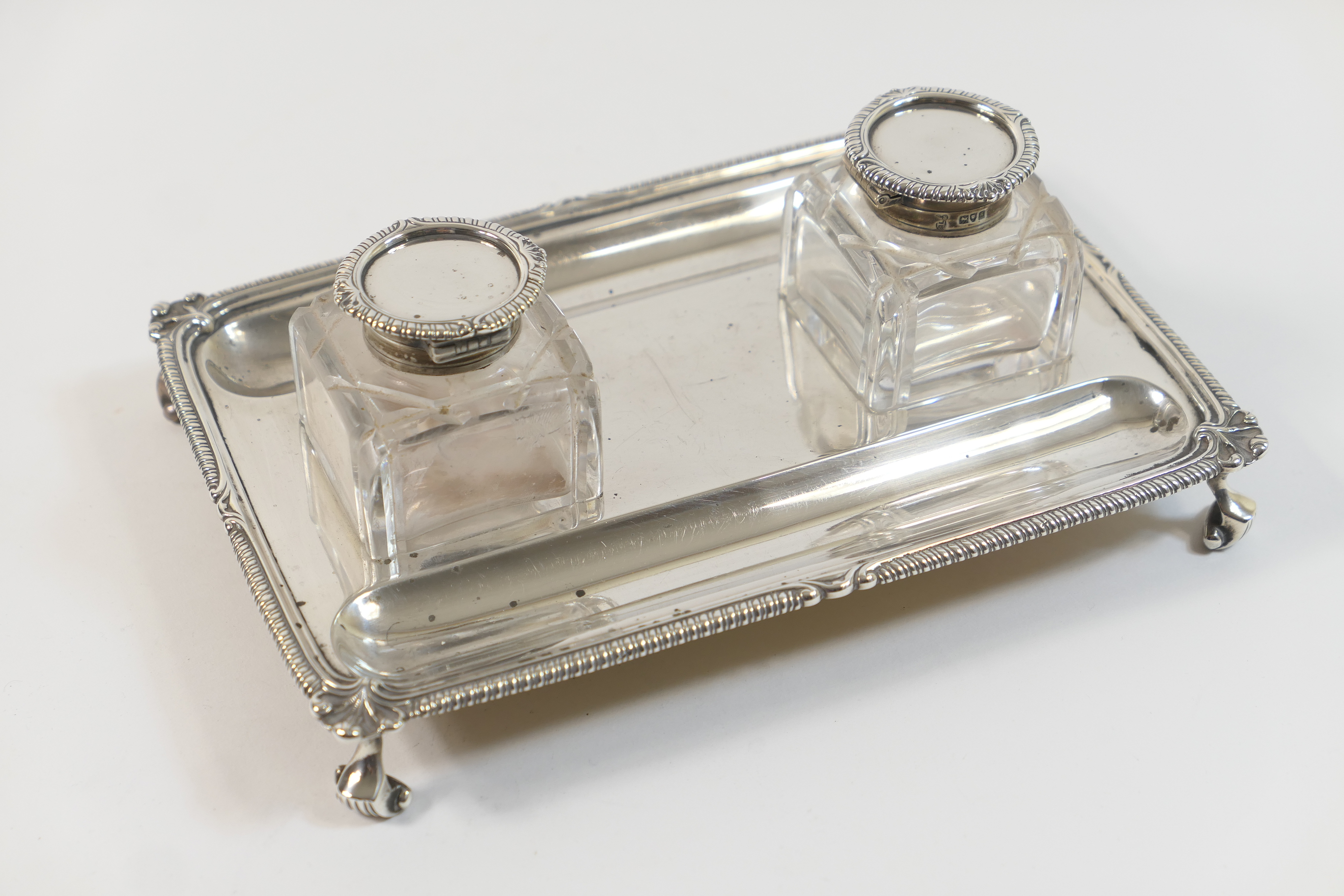 George V silver inkstand, by Harris & Sons, London 1913, rectangular form with gadrooned