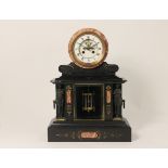 French slate mantel clock, circa 1875, having a white enamelled dial with Roman numerals, visible