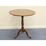 Mahogany and yewood tilt top tripod table, the circular top over a turned yewood column and three