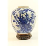 Chinese blue and white ginger jar, 18th or 19th Century, decorated with panels of birds amidst peony