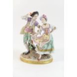 Sitzendorf porcelain figure group of dancing courtiers, decorated in colours heightened with gilt,