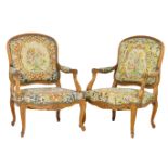 Pair of French oak fauteils, late 19th Century, tapestry upholstered back and seat detailed with