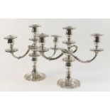 Pair of silver plated three branch candelabra, in Victorian style, worked throughout with floral