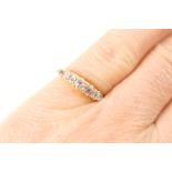 Diamond five stone ring, the old round cut stones graduating in size and totalling approx. 0.25ct,