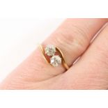 Diamond two stone crossover ring, old round brilliant cut stones of approx. 0.3ct each, in claw