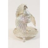 Continental white metal filigree table pomander, formed as a peacock with hinged cover, standing