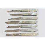 Seven Victorian silver and mother of pearl folding fruit knives, all Sheffield hallmarks:- 1845,