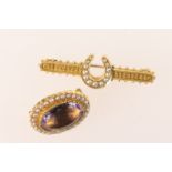 Victorian amethyst and pearl brooch, circa 1880, the oval cut amethyst approx. 16mm x 12mm, bordered